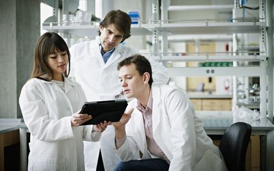 Researchers working on a replication study