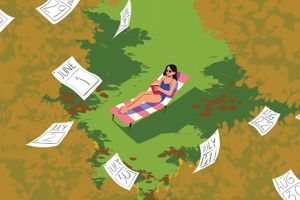 Woman reading book in the park while calendar pages fly around her