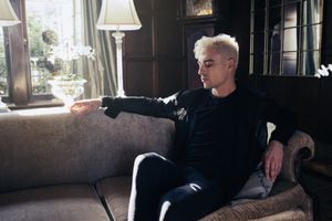Portrait of handsome man with platinum blonde hair 