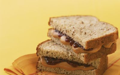 Peanut butter and jelly sandwich on whole grain bread