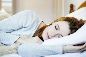 Woman asleep in bed