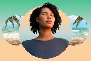 Woman meditating against a beach backdrop