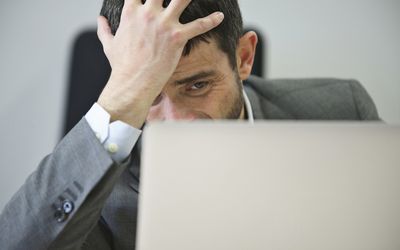 Young businessman looking stressed