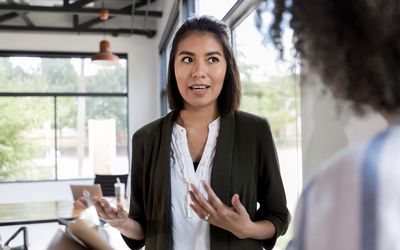 Woman being defensive at work.