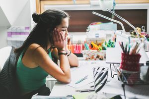 young woman having trouble focusing