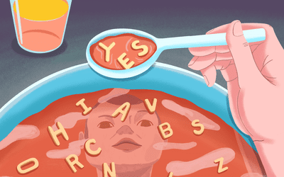  a person eating a bowl of alphabet soup, with the letters in their spoon spelling out the word yes. The soup shows the person's reflection as well.