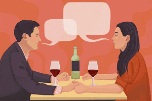 a couple talking over wine at a restaurant