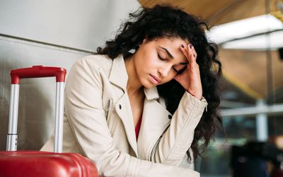 Upset woman at airport