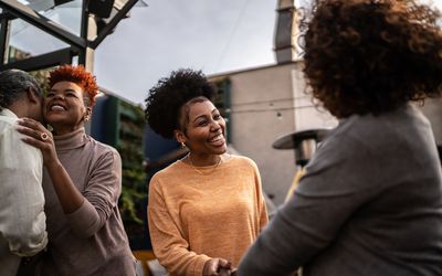 Woman greeting friends