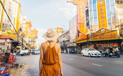 Young woman walking in Chinatown