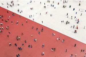 Crowds standing on two separated zones