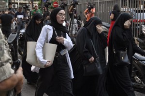 Friends and relatives of injured people arrive at the American University of Beirut Medical Center in Lebanon.