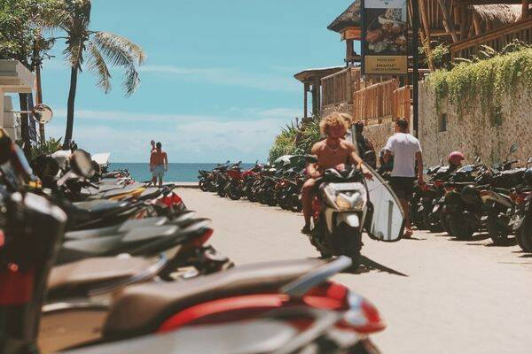 Lounging under umbrellas in Bali by Mark C