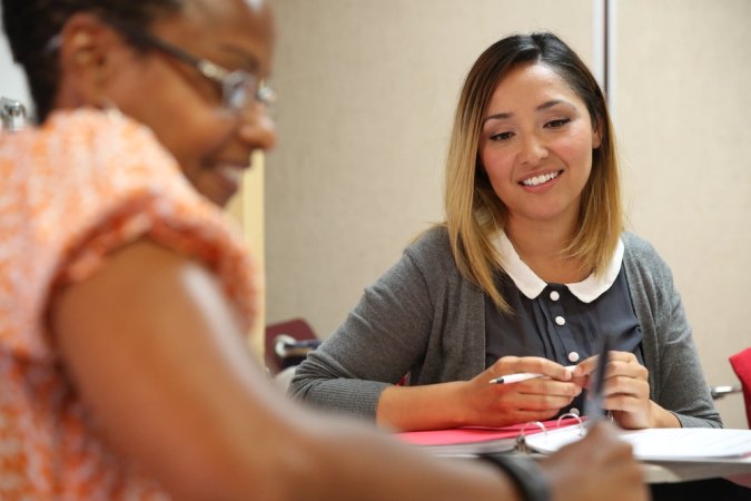 Melissa Helms, a Leadership Education Seminar participant, from Hayward, Calif., is interviewed by another participant during a small group activity aboard Marine Corps Base Camp Pendleton, Calif., April 29, 2014.