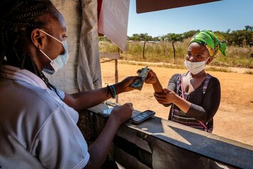 Mulumbwa (25) and her family fled violence in the Democratic Republic of Congo (DRC) in 2017.  © WFP/Andy Higgins