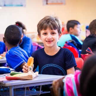 WFP provides healthy school meals and fortified date bars to over 500,000 vulnerable schoolchildren across the kingdom including Syrian refugee camps.