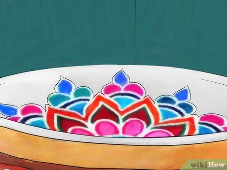 Step 4 Incorporate rangoli into your diya designs.