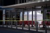 A police officer stands near an evidence tent outside the Queen Elizabeth Theatre in Vancouver, on Sept. 4. Police in Vancouver have identified both the man charged in Wednesday's gruesome stranger attacks and the victim killed in one of the attacks. THE CANADIAN PRESS/Darryl Dyck