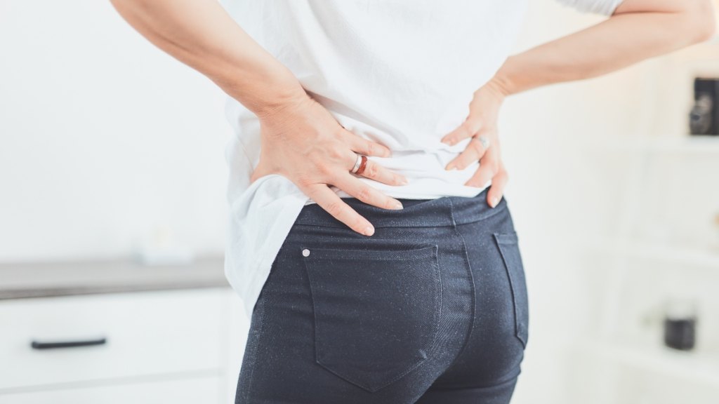 A woman with lower back pain