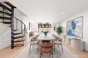 NYC duplex in Hell's Kitchen - spiral staircase leads down to dining room