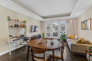 living room and balcony in Astoria - homes with central air