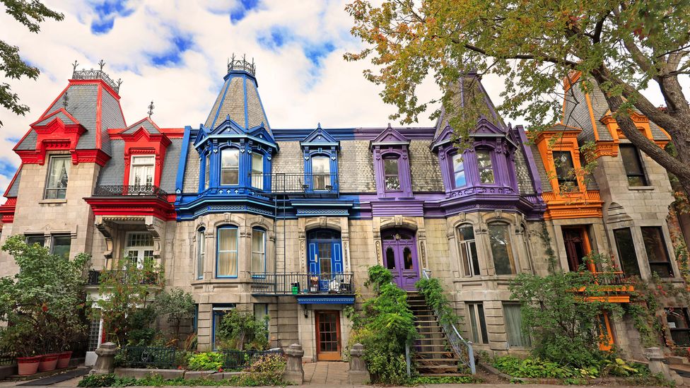 Montreal's Plateau neighbourhood is home to brightly painted houses and Forgione's pick for a sublimely cross-cultural poutine (Credit: Getty Images)